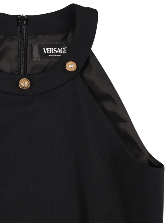 Versace   Sleeveless jersey dress w/ logo buckle 